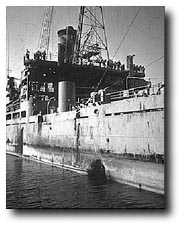 USS Liberty with gaping hole from Israeli Torpedo Attack