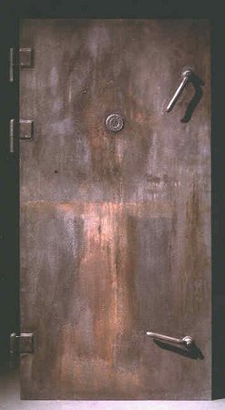 Is this the Erich von Stroheim version of an ordinary door? Door with monocle--it must mean something. Where is Sigmund Freud when we really need him?